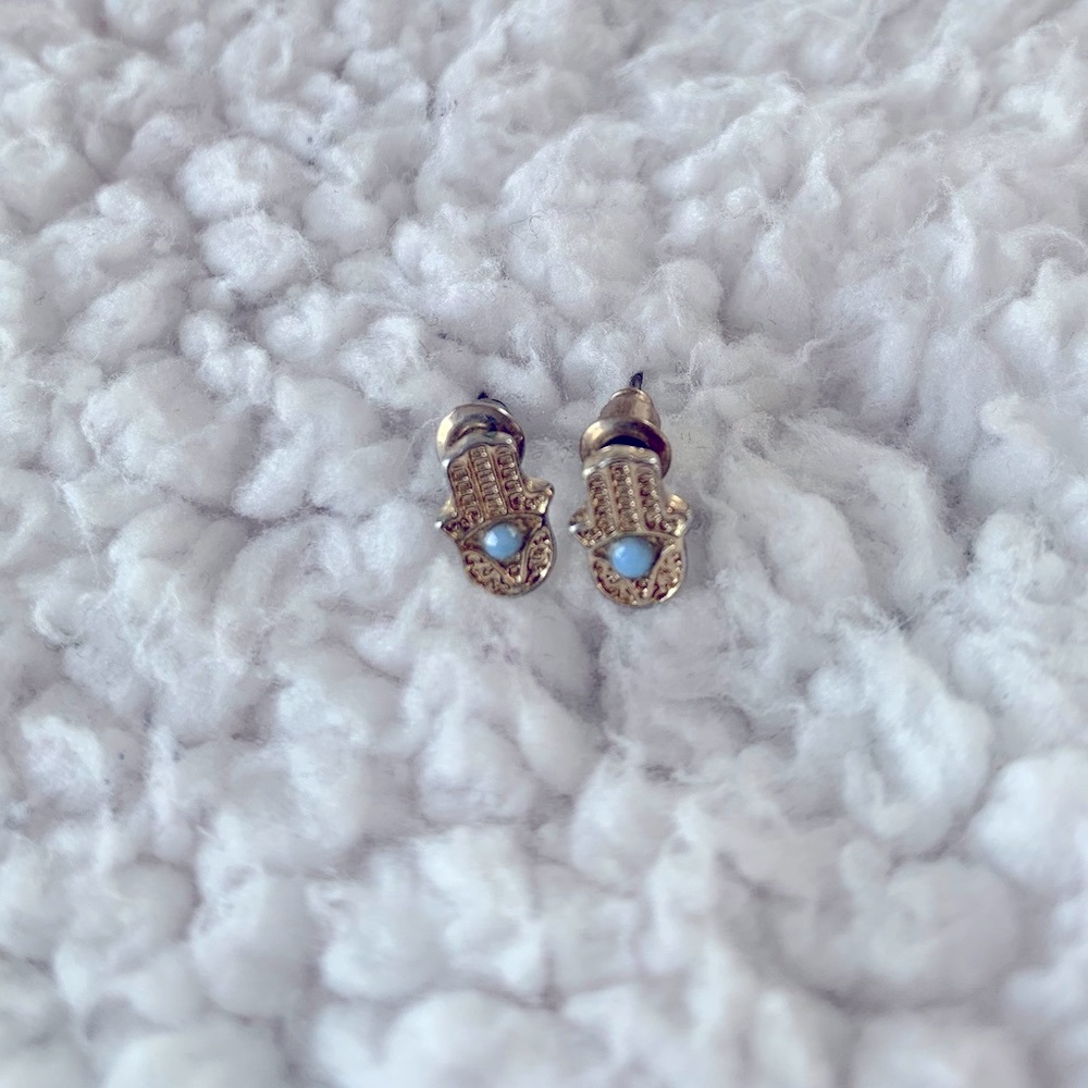 Never worn hamsa studs.
